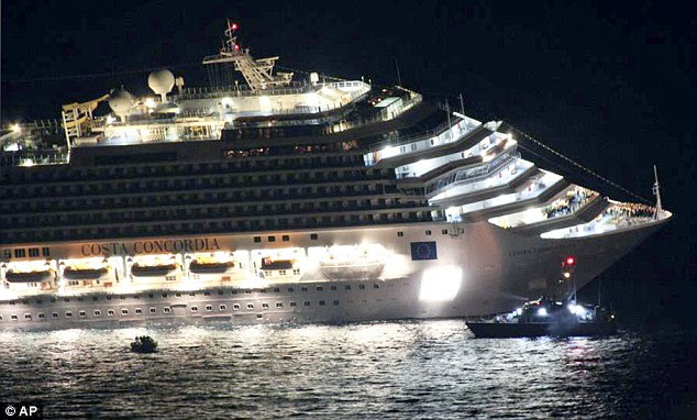 Gashed open: The hull of the massive Costa Concordia was gashed open as it ran aground, killing at least eight and injuring dozens more