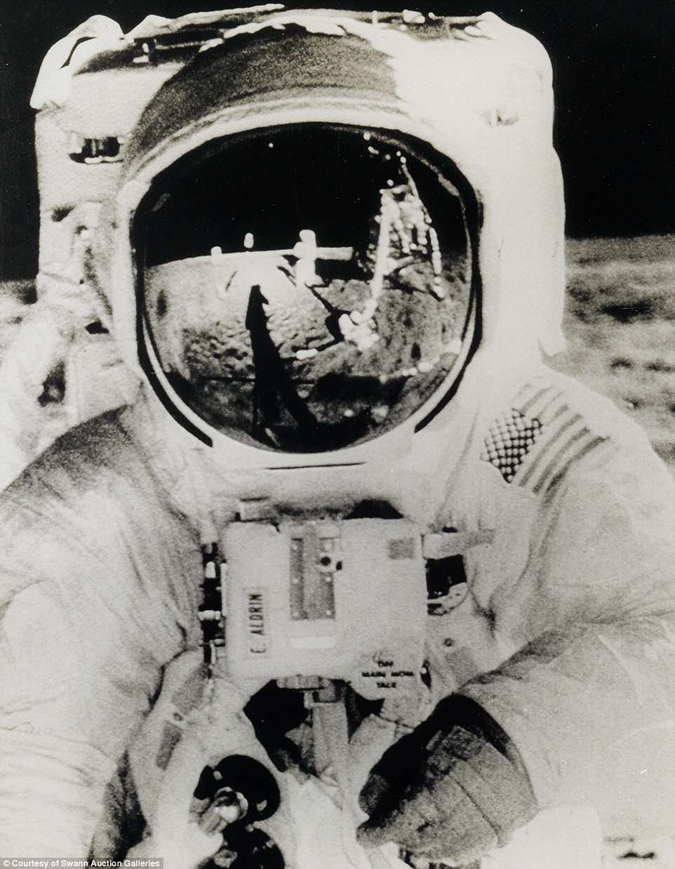 An incredible collection of 15,000 photos from the US's remarkable space programme is going up for auction. Pictured is a photo of Buzz Aldrin taken by Neil Armstrong on the lunar surface
