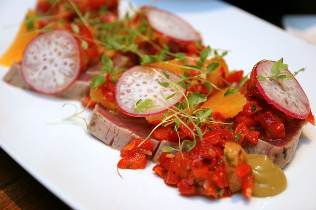 Yellowfin tuna loin (served rare), with smoked avocado, dried apricot, red pepper and orange