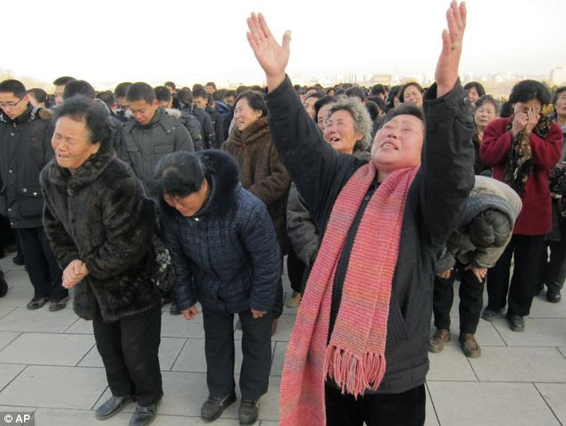 Cry, or else: North Koreans cry and scream as they lament the loss of Kim Jong-il - those who did not follow the strict rules of mourning were severely punished