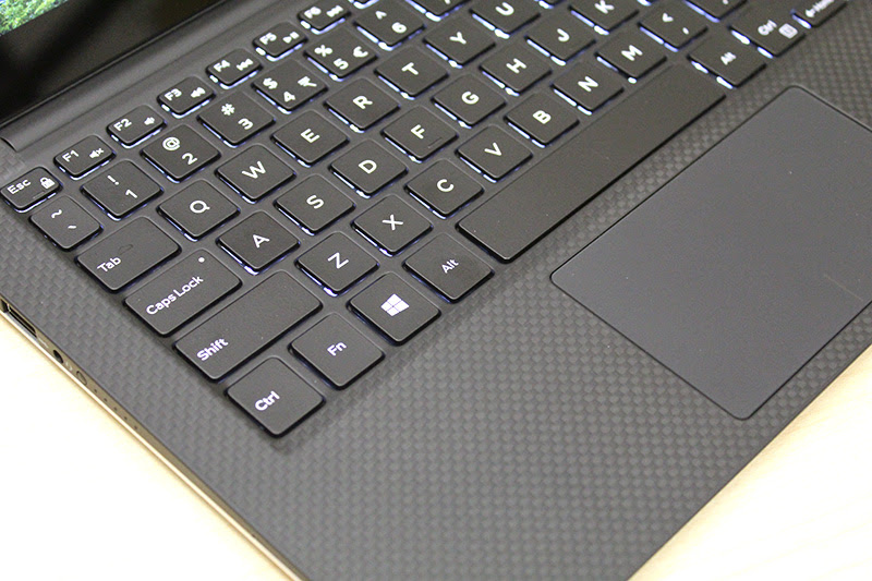 The keyboard panel is made out of carbon fiber and is coated with soft touch paint, giving it an almost rubbery feel.