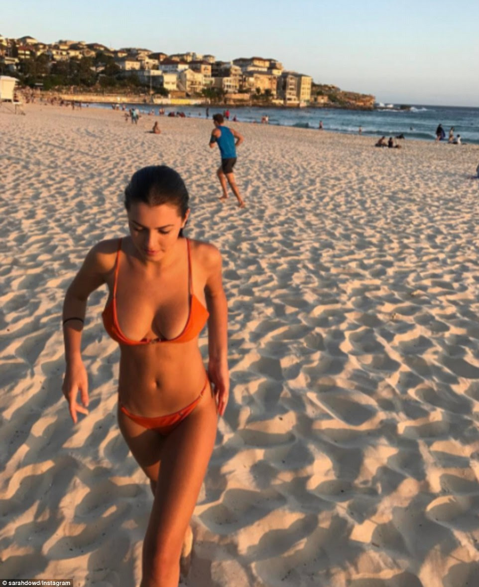 NSW Health's Dr Ben Scalley said ozone pollution is caused by car exhaust and industrial fumes and gets worse on hot, still days. Above, a woman at Bondi beach as the sun sets