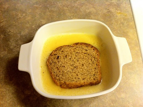 Soaking bread in egg mixture