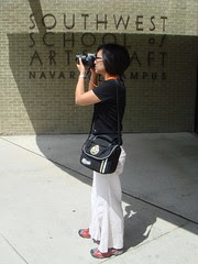 Antoinette taking a picture of the library