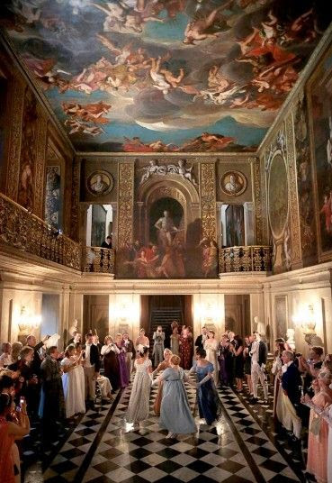 Ladies perform a Regency dance as guests take photos on their not-so-Regency cameras and mobile phones. This takes place at an event inspired by our production, Pride and Prejudice. http://www.telegraph.co.uk/news/picturegalleries/10137639/Oh-Mr-Darcy.html?frame=2597908