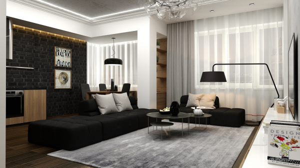 This black and white living room has a sleek, artistic bent to it. A perfect setting for a martini or two.