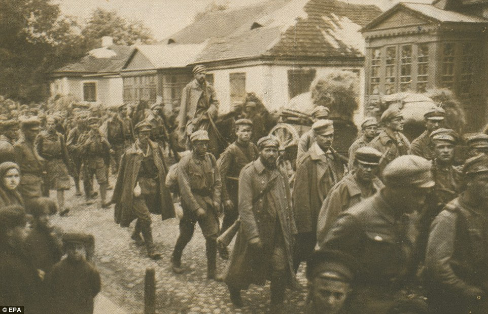 epa04298306 A handout picture provided by the Multimedia Art Museum, Moscow (MAMM) press service in Moscow, Russia on 04 July 2014, shows an old photograph entitled 'Infantry of the 1st Brigade Polish Legions enters Kowel, 1915' by an unknown identity, from a collection of the Polish Army Museum in Warsaw. MAMM is presenting multimedia project 'The War That Ended Peace' organized together with major international museums, state archives and private collectors of Russia, France and Italy to mark the 100th anniversary of the First World War. The exhibition runs from 04 July to 19 October 2014.  EPA/POLISH ARMY MUSEUM / HANDOUT EDITORIAL USE ONLY IN CONNECTION TO THE REPORTING ON THE STORY HANDOUT EDITORIAL USE ONLY/NO SALES