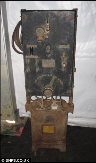 The six foot tall recharging station for the Detroit Electric Model D, which gave the car a range of 100 miles on a full charge