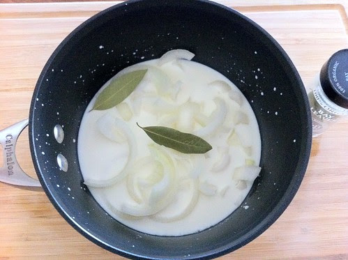 Onion and Bay Leaves Added to Milk