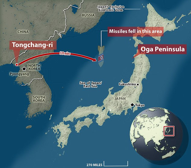 The Defense Ministry said the missiles flew about 539 nautical miles after being launched from Tongchang-ri (Sohae Satellite Launching Station). Three missiles fell within Japan's exclusive economic zone (pictured light blue), 188 miles to 215 miles west of the Oga Peninsula