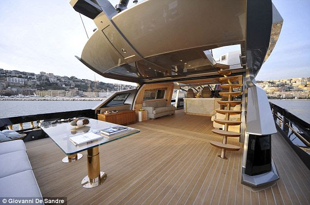 Gold standard: The boat is covered in precious metals - even the anchor has been given a special makeover