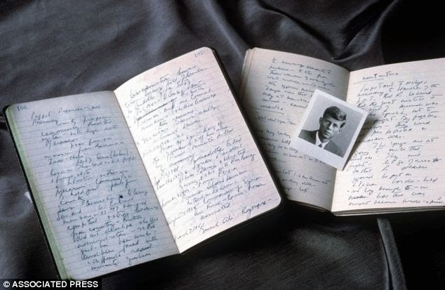 Revealing: Presidential diaries and photographs are among more than 500 items from a collection John F. Kennedy documents and artifacts