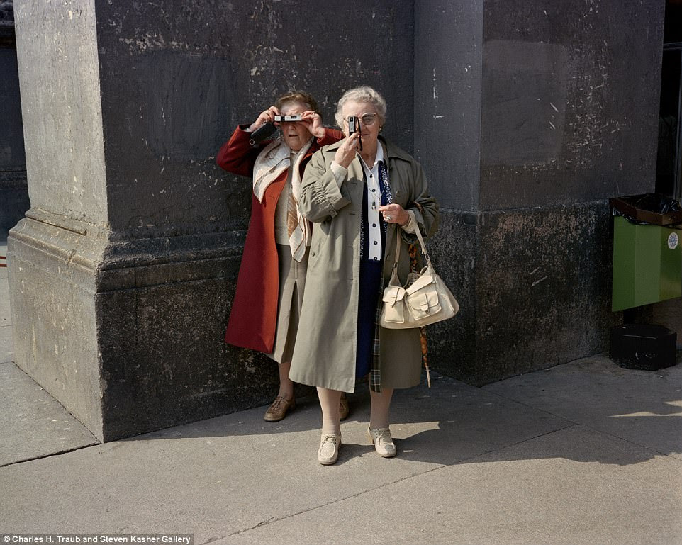 Right back at you: Two elderly women photograph Traub as he works in Milan in 1981