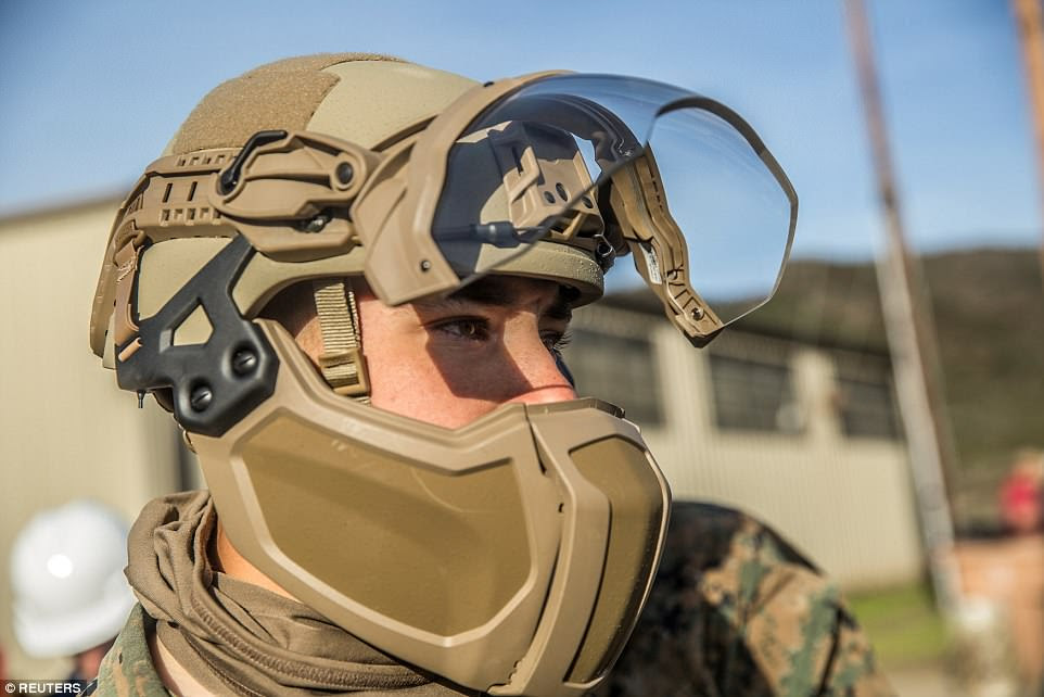 A Marine wears an Enhanced Combat Helmet (EHC) with detachable visor and mandible during the exercises