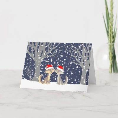 http://rlv.zcache.com/two_wolves_in_winter_christmas_greeting_card-p137333272556079248q6k5_400.jpg