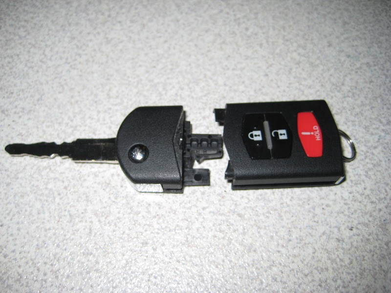 mazda key battery replacement cost