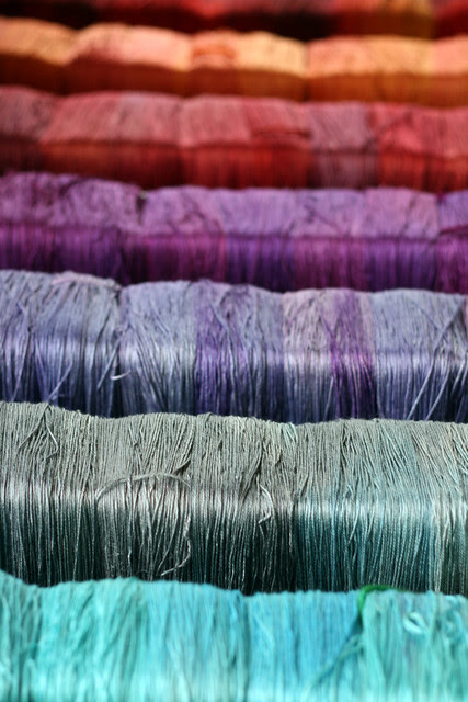 Silks drying on a rack 