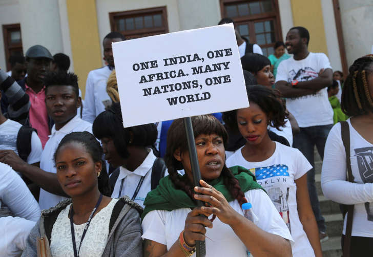 African students participate in a protest against the alleged assault of Tanzanian woman in Bangalore, India, Saturday, Feb. 6, 2016.