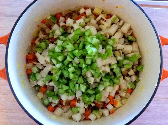Diced Celery and Potatoes Added to Dutch Oven
