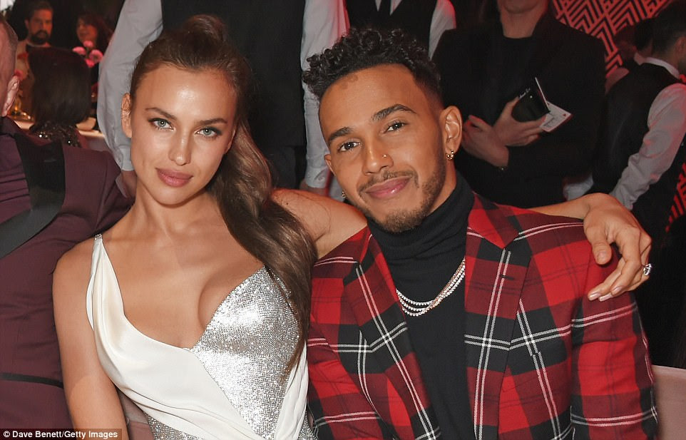 Snapped! Model Irina and Formula One ace Lewis also got together to take a shot as a host of guests mingled around them