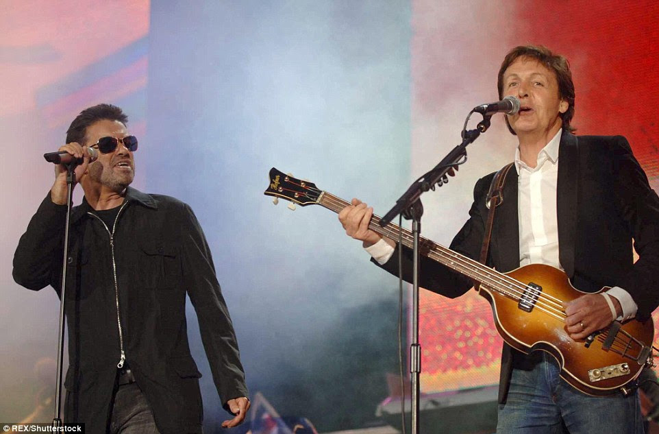 Pictured: George Michael and Beatles legend Paul McCartney on stage during a star-studded performance at the Live8 concert in Hyde Park, London, in July, 2005