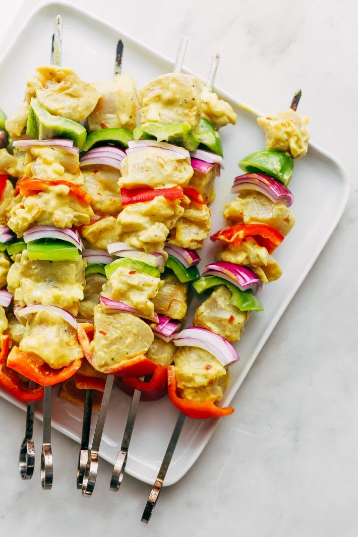 Easy Persian Chicken Kebabs - marinated in one secret ingredient that makes the chicken so tender it just melts in your mouth! #chickenkebabs #shishkebabs #persianchickenkebabs #jujehchicken | Littlespicejar.com