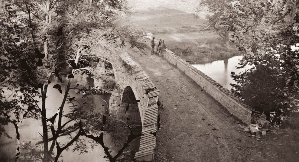 Then: Although peaceful in this picture, Burnside Bridge was the site of some of the most extreme fighting during the battle