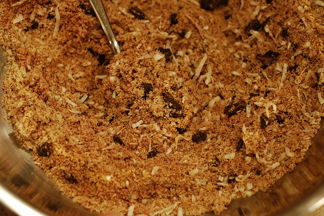 Mixing the almond meal, chocolate and chocolate for the gluten and dairy-free almond coconut chocolate chunk cookies by Eve Fox, the Garden of Eating blog, copyright 2013