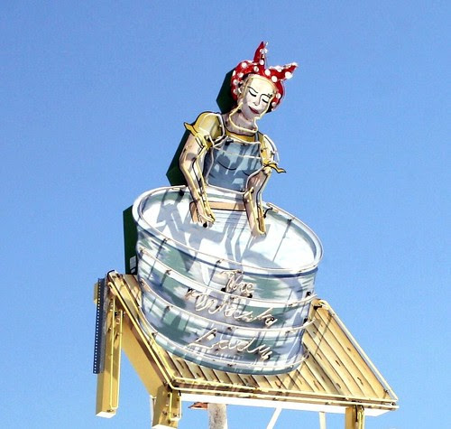 the wash lady neon sign atop boulevard cleaners & laundromat on route 66