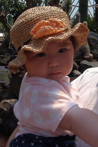Miyu with a hat, knitted by her grandmother