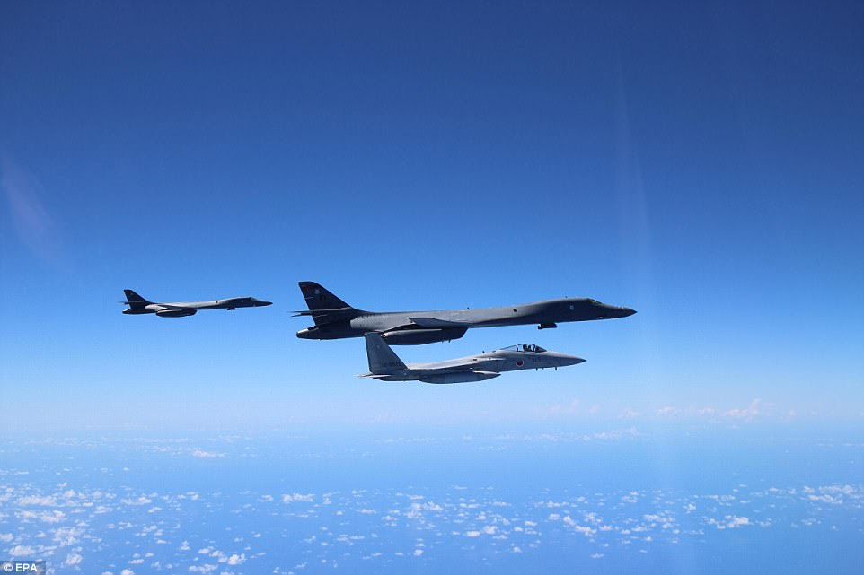 Japan conducted air manoeuvers with US bombers near the Korean peninsula on Wednesday, Japan's Air Self Defence Force said in a news release