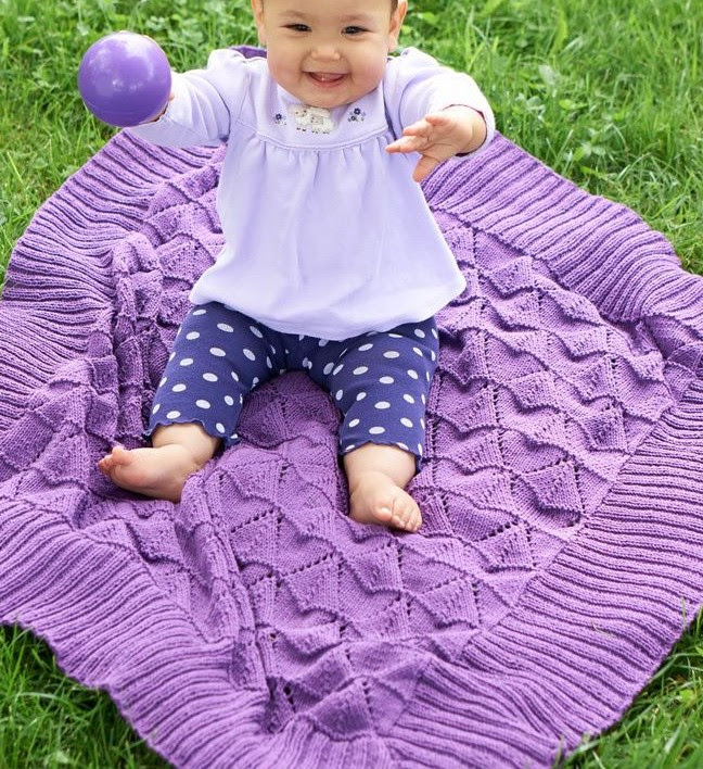 Free knitting pattern for Light and Lovie Baby Blanket with triangle lace pattern and more baby blanket knitting patterns