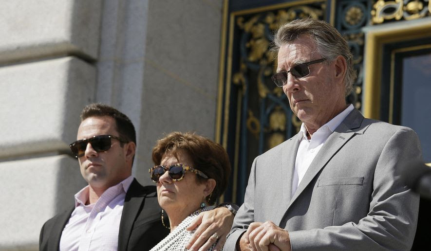 In this Sept. 1, 2015, file photo, from left, Brad Steinle, Liz Sullivan and Jim Steinle, the brother, mother and father of Kate Steinle who was shot to death on a pier, listen to their attorneys speak during a news conference on the steps of City Hall in San Francisco. (AP Photo/Eric Risberg, File)