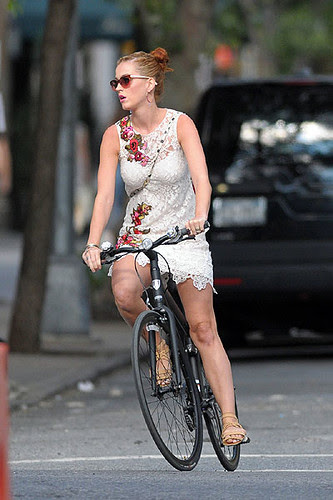 7 katy perry rides a bike