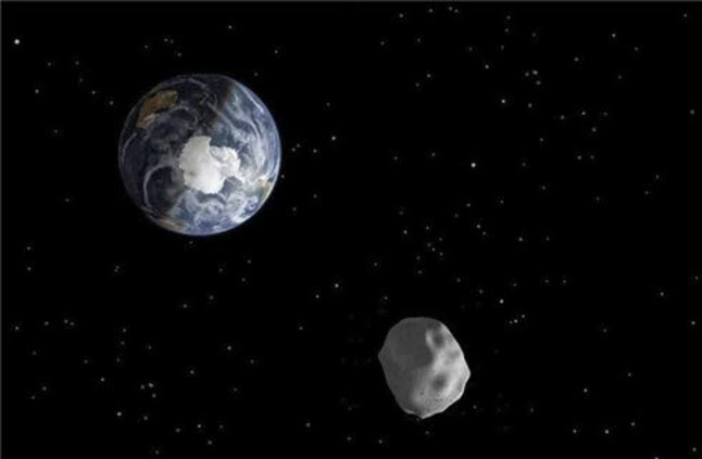 Imagen de una recreación distribuida por la NASA que representa el paso de un asteroide.