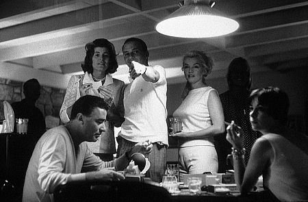 "Look! Here comes Transman and his little hooligans!" Marilyn Monroe and Frank Sinatra as Transman's sister and her husband.