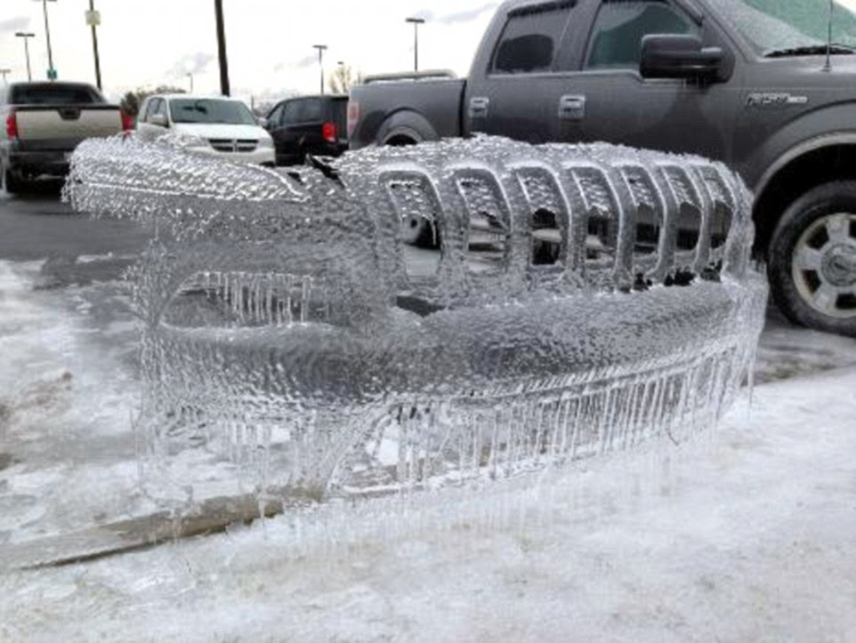 An amusing sight: In this photo - which proves just how cold it has been across large swathes of the US this winter - an icy imprint of a Jeep's bumper remains standing in a parking lot in Greenville, North Carolina - long after the vehicle was driven away by its owner
