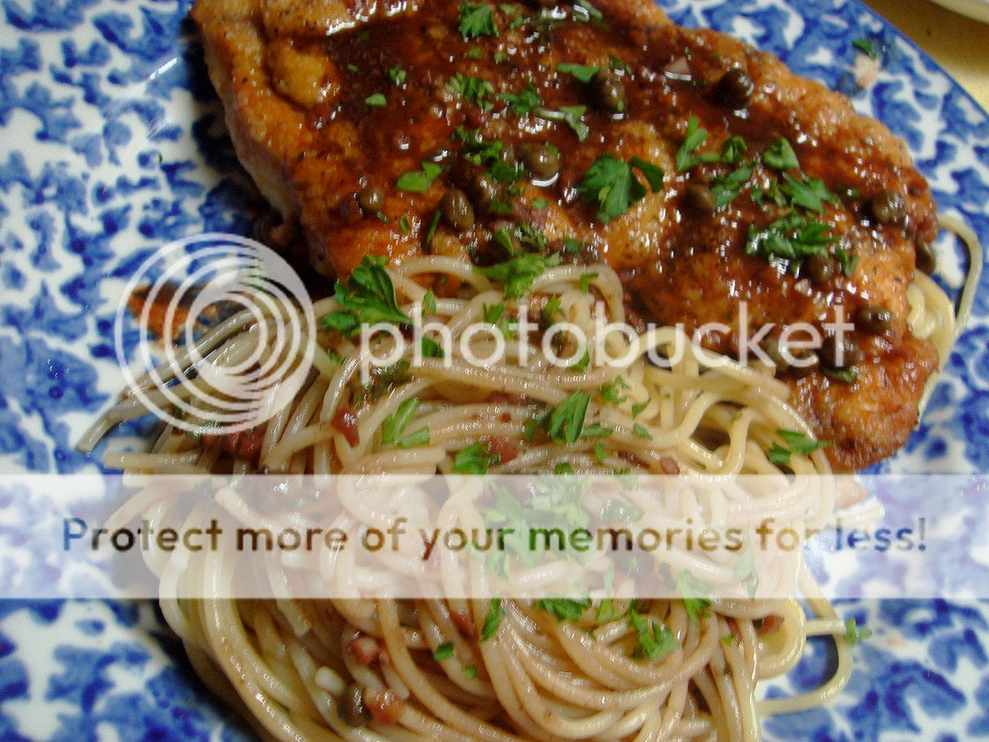 chicken cutlet with pomegranate sauce and spaghetti