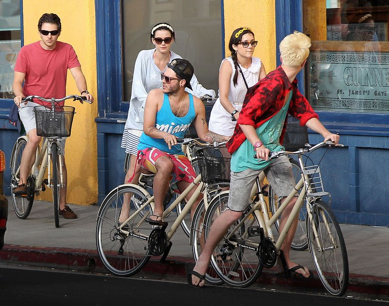 3 katy perry rides a bike