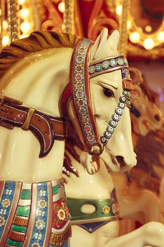 Carousel Horse.  These Carousel/merry-go-round horses are hand carved and painted in fancy trappings, saddle blankets, flowers, armor, saddles with western motif's.
