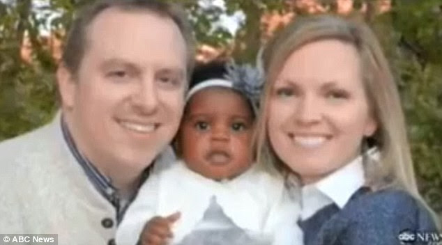 Fighting: Utah couple Jared and Kristi Frei, pictured with Leah, have filed a motion asking that Judge Darold McDade stay his order dismissing their adoption petition and requiring the baby be returned