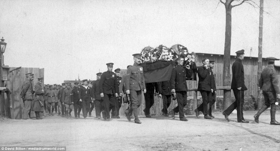 This photograph shows a funeral for a British Prisoner of War: During the war, the German authorities published a photographic account of PoW life 