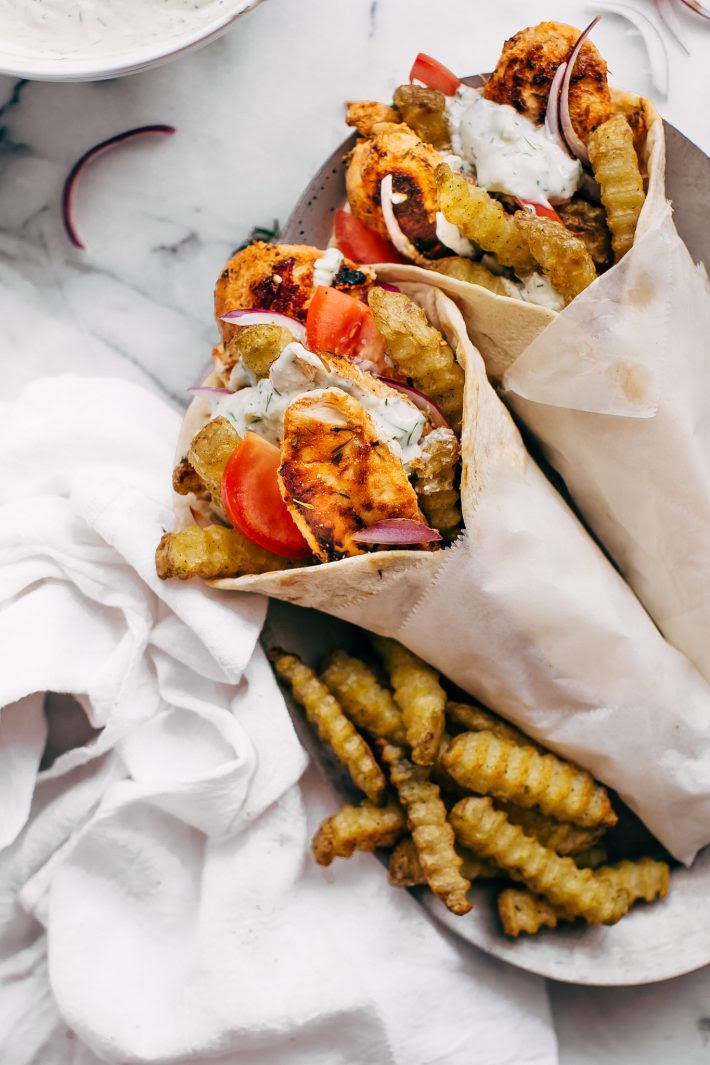 Easy Chicken Gyros with French Fries and Tzatziki Sauce - Learn how to make the easiest chicken gyros! Perfect for weeknight dinners! #chickengyros #gyros #gyrosrecipe #greekchicken | Littlespicejar.com