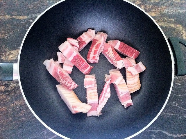Sliced Bacon Added to Hot Wok