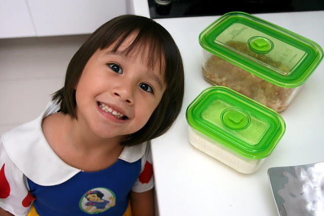 The glass range is not so easy for kids to open, because it seals tightly and only releases with the button on the lid