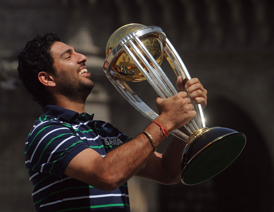 Player of the Tournament Yuvraj Singh with the World Cup Player of the Tournament Yuvraj Singh with the World Cup