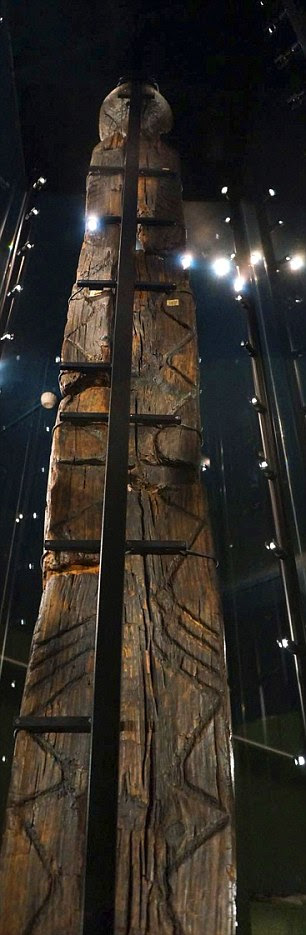The Shigir Idol is covered in carvings, including what looks like code. It stands 9.2ft (2.8 metres) in height but originally was 17.4ft (5.3 metres) tall - as high as a two storey house