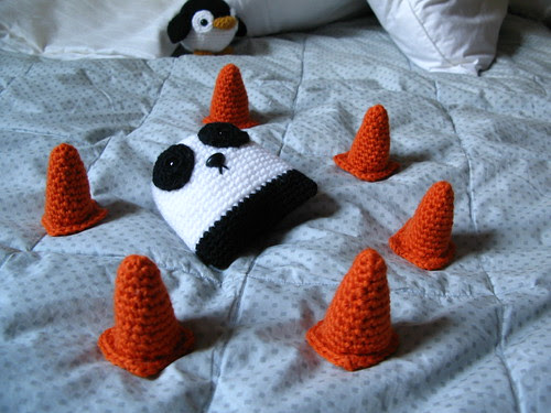 Limb-less panda and safety cones