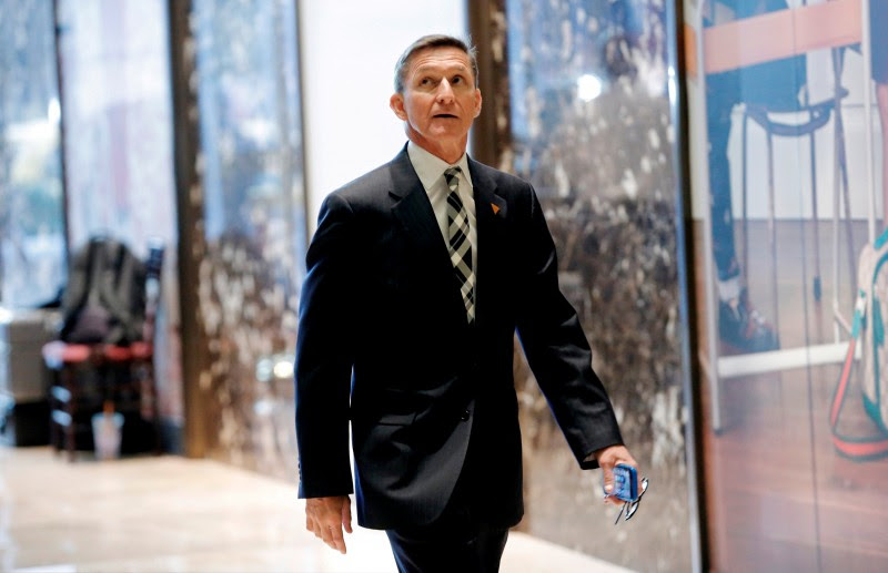 Retired U.S. Army Lieutenant General Michael Flynn boards an elevator as he arrives at Trump Tower where U.S. President-elect Donald Trump lives in New York (REUTERS)