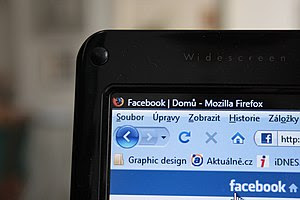 Picture of notebook screen with Facebook and F...